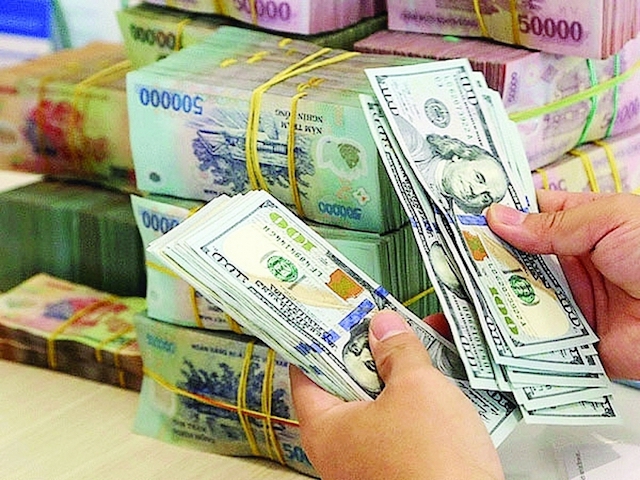Ngân hàng Nhà nước: Việt Nam không thao túng tiền tệ - Ảnh 1