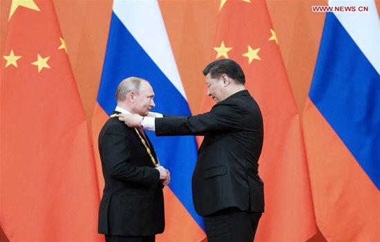 Tổng thống Putin trở thành người đầu tiên nhận “Huân chương Hữu nghị” của Trung Quốc - Ảnh 1