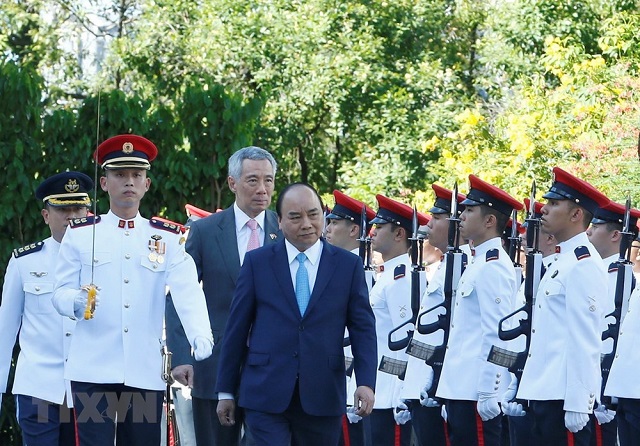 [Photo] Lễ đón chính thức Thủ tướng Nguyễn Xuân Phúc thăm Singapore - Ảnh 3