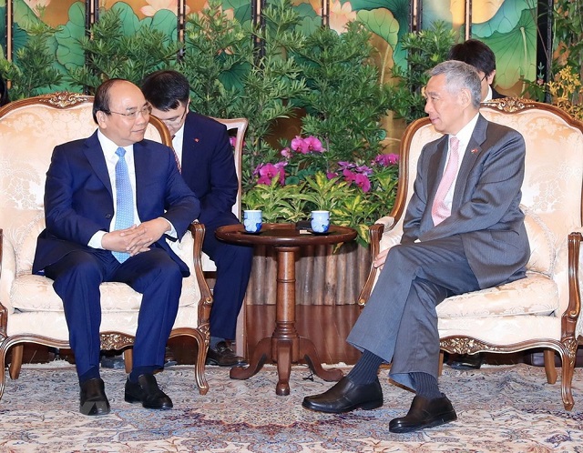 [Photo] Lễ đón chính thức Thủ tướng Nguyễn Xuân Phúc thăm Singapore - Ảnh 5