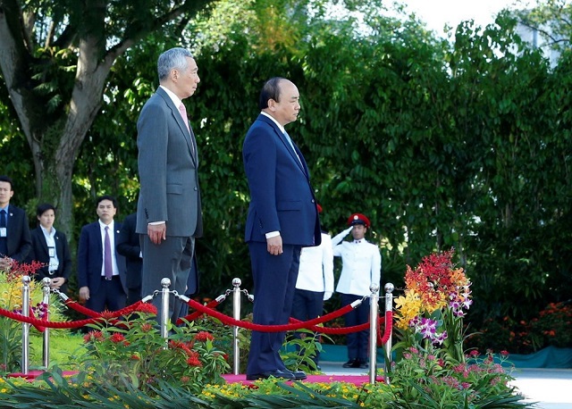 [Photo] Lễ đón chính thức Thủ tướng Nguyễn Xuân Phúc thăm Singapore - Ảnh 1