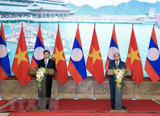 Hai Thủ tướng Việt Nam-Lào họp báo sau Kỳ họp 42 Ủy ban liên Chính phủ - Ảnh 1