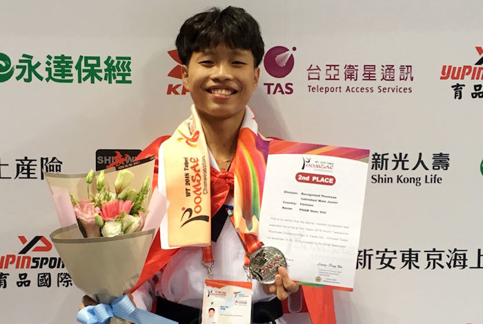 Nhà vô địch Taekwondo thế giới 2019 Phạm Quốc Việt: Nghị lực sau những tấm huy chương - Ảnh 1