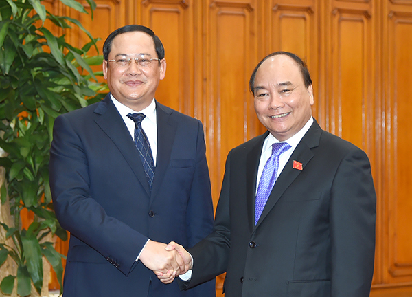 Thủ tướng Nguyễn Xuân Phúc tiếp Phó Thủ tướng Lào - Ảnh 1