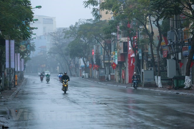 Hà Nội có mưa nhỏ trong ngày mùng 4 Tết - Ảnh 1