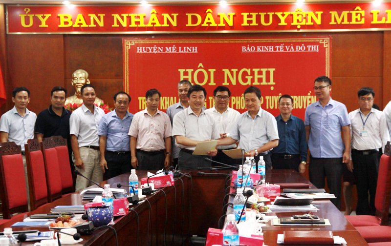 Báo Kinh tế & Đô thị đẩy mạnh hợp tác thông tin tuyên truyền với huyện Mê Linh - Ảnh 1