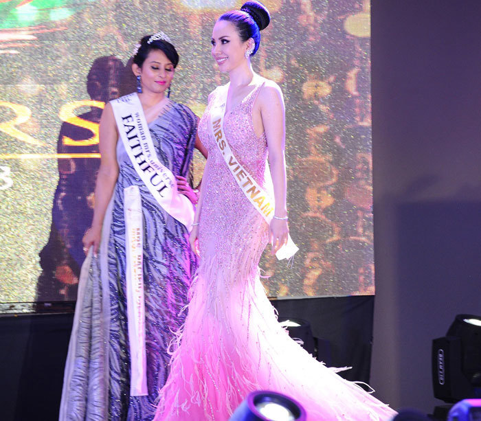 Đại diện Việt Nam thắng giải "Hoa hậu mặc trang phục dân tộc đẹp nhất" tại Mrs Universe 2018 - Ảnh 5