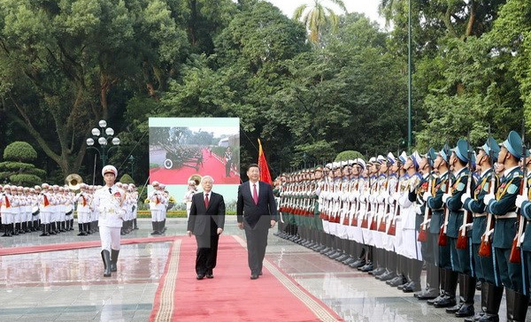 Tổng Bí thư Nguyễn Phú Trọng chủ trì Lễ đón Tổng Bí thư Trung Quốc - Ảnh 1