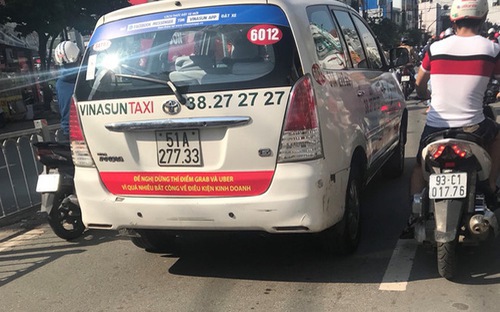Vụ taxi truyền thống “công kích” Uber, Grab: Bộ Công Thương lên tiếng - Ảnh 1