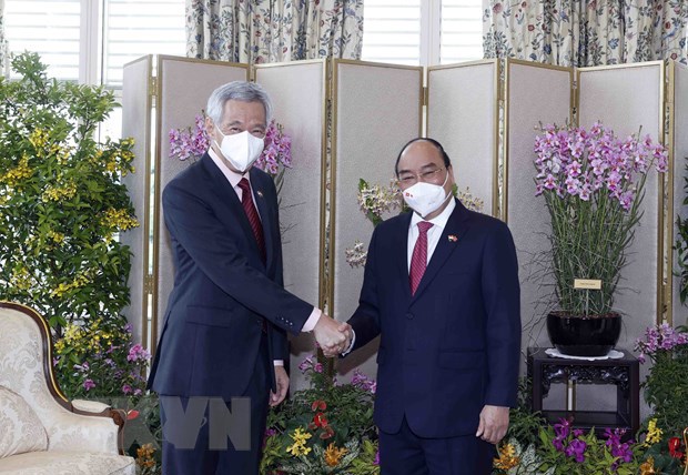 Chủ tịch nước Nguyễn Xu&acirc;n Ph&uacute;c gặp Thủ tướng Singapore L&yacute; Hiển Long. (Ảnh: Thống Nhất/TTXVN)