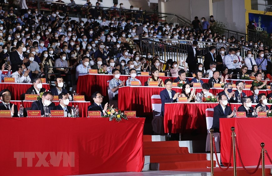 Thủ tướng Phạm Minh Ch&iacute;nh v&agrave; c&aacute;c đại biểu dự Lễ khai mạc Năm du lịch quốc gia năm 2022. (Ảnh: Dương Giang/TTXVN)