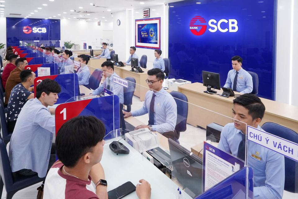 &nbsp;Giao dịch tại Ng&acirc;n h&agrave;ng TMCP S&agrave;i G&ograve;n (Ảnh: SCB).