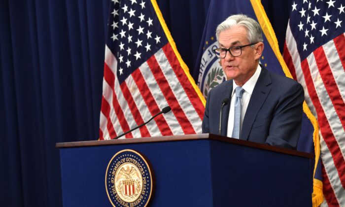 Chủ tịch Fed Jerome Powell ph&aacute;t biểu tại buổi họp b&aacute;o h&ocirc;m 14/12. Ảnh: AFP