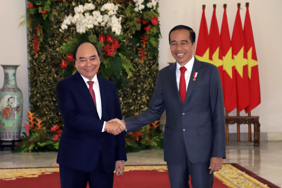 Chủ tịch nước Nguyễn Xuân Phúc và Tổng thống Indonesia Joko Widodo. Ảnh:TrầnThường