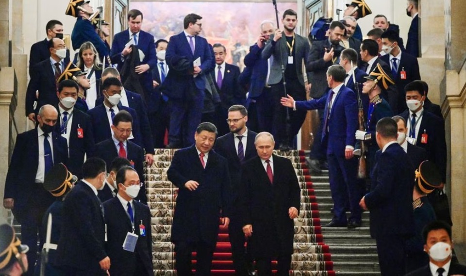 Chủ tịch Trung Quốc Tập Cận B&igrave;nh v&agrave; Tổng thống Nga Vladimir Putin h&ocirc;m 21/3. Ảnh: Sputnik