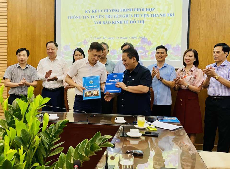 Báo Kinh tế và Đô thị ký kết chương trình phối hợp với huyện Thanh Trì - Ảnh 3