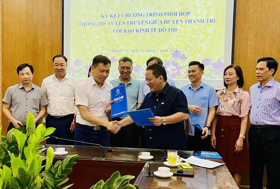 Báo Kinh tế và Đô thị ký kết chương trình phối hợp với huyện Thanh Trì - Ảnh 2