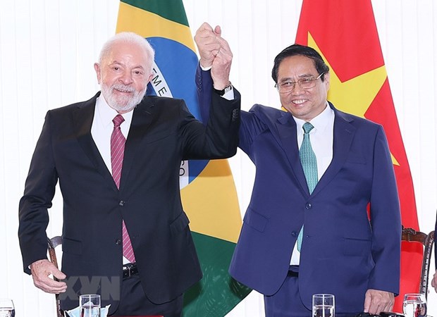 Thủ tướng Phạm Minh Ch&iacute;nh với Tổng thống Brazil Lula da Silva. (Ảnh: Dương Giang/TTXVN) &nbsp;
