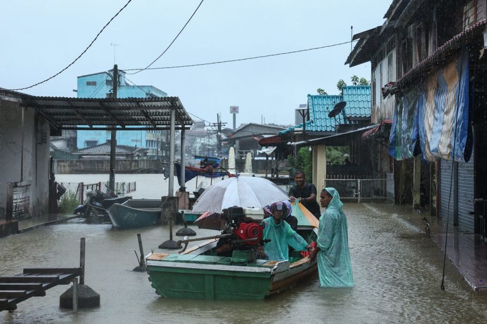 Nhà cửa tại Kelantan, Malaysia ngập trong lũ lụt. Ảnh: SCMP