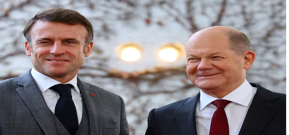 Tổng thống Ph&aacute;p Emanuel Macron v&agrave; Thủ tướng Đức Olaf Scholz. Ảnh: Reuters