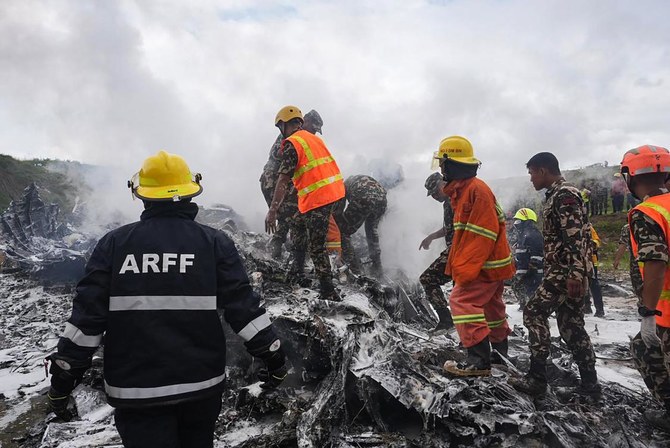 Hiện trường vụ rơi m&aacute;y bay tại s&acirc;n bay quốc tế Tribhuvan ở thủ đ&ocirc;&nbsp;Kathmandu của Nepal. Ảnh: AFP