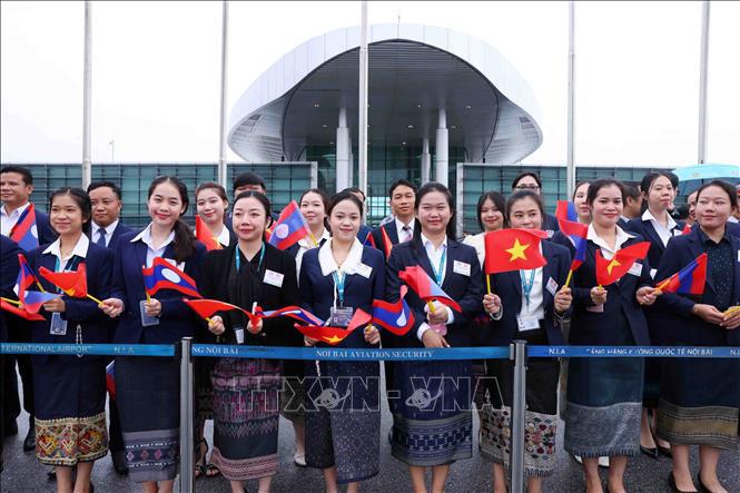 Tổng Bí thư, Chủ tịch nước Lào bắt đầu thăm cấp Nhà nước tới Việt Nam - Ảnh 5