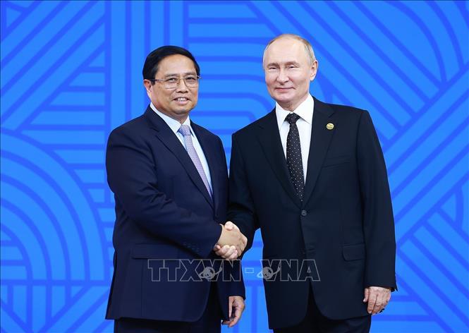 Tổng thống Li&ecirc;n bang Nga Vladimir Putin, Chủ tịch Nh&oacute;m BRICS năm 2024, đ&oacute;n Thủ tướng Phạm Minh Ch&iacute;nh. Ảnh:&nbsp; TTXVN